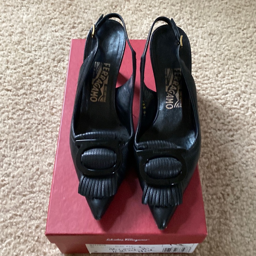 Salvatore Ferragamo sling back pumps.